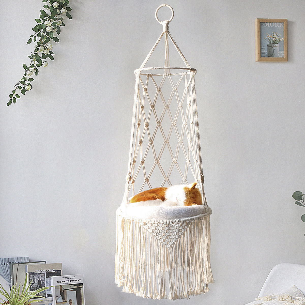Hanging macrame chair with fringe in a room setting
