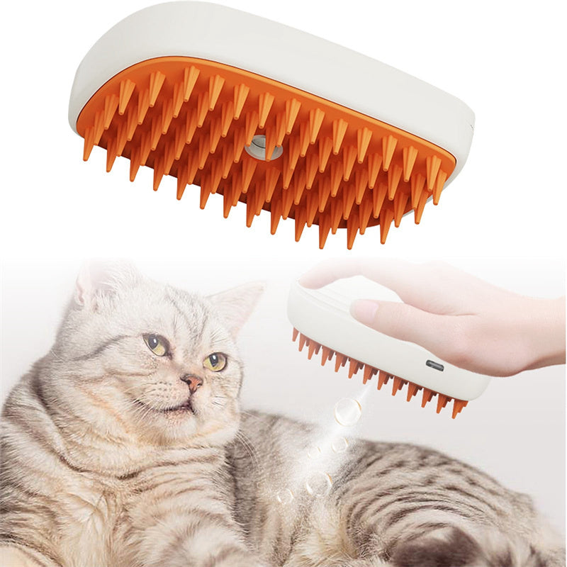 Pet grooming brush with orange bristles being used on a cat-waggloo