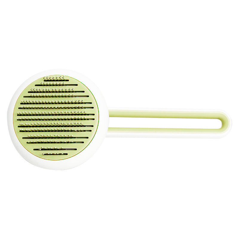 Green kitchen grater on a white background