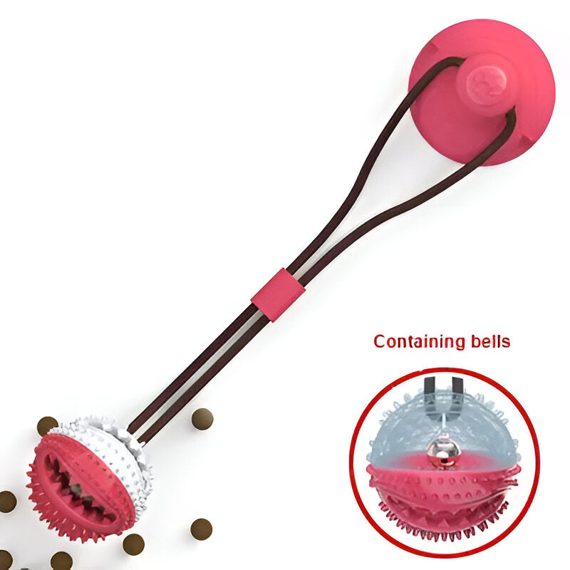 A dog toy featuring a red and blue leaky ball with a suction cup and a red tug-of-war handle, intended for chew and tug play to clean teeth.