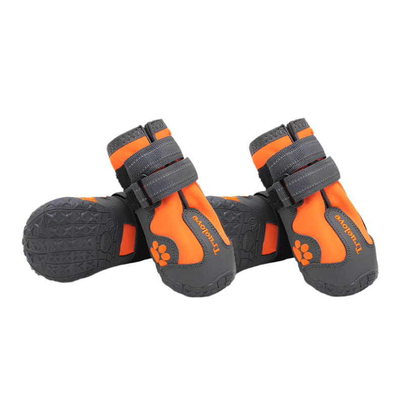 Orange and gray dog boots with brand logo on a white background