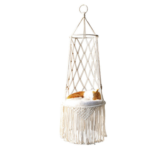Hanging macrame chair with a cushion on a white background