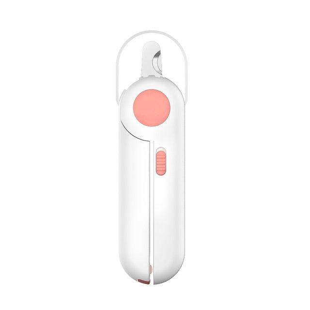 A hand holding a pair of LED pet nail clippers with a pink non-slip handle and built-in LED light being used on a pet's nail.