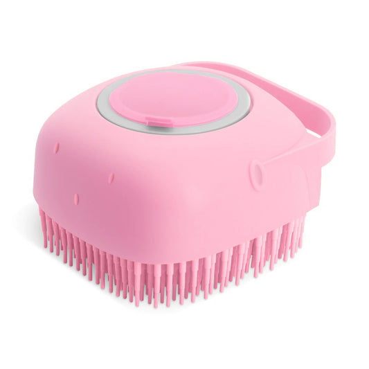Three kittens sitting in a metal bucket with a blue silicone pet bath and massage brush in front.